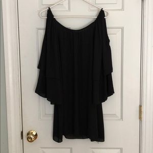 Black dress with open shoulder and bell sleeves